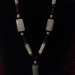 Jade barrel pendant with magnetic beads, glass & ceramic spacers, glass cut & Swarovski crystals.  $100