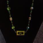 Mother of Pearl Pendant w/glass cut beads, Agate rounds, spotted jade barrels & Swarovski Crystals $120